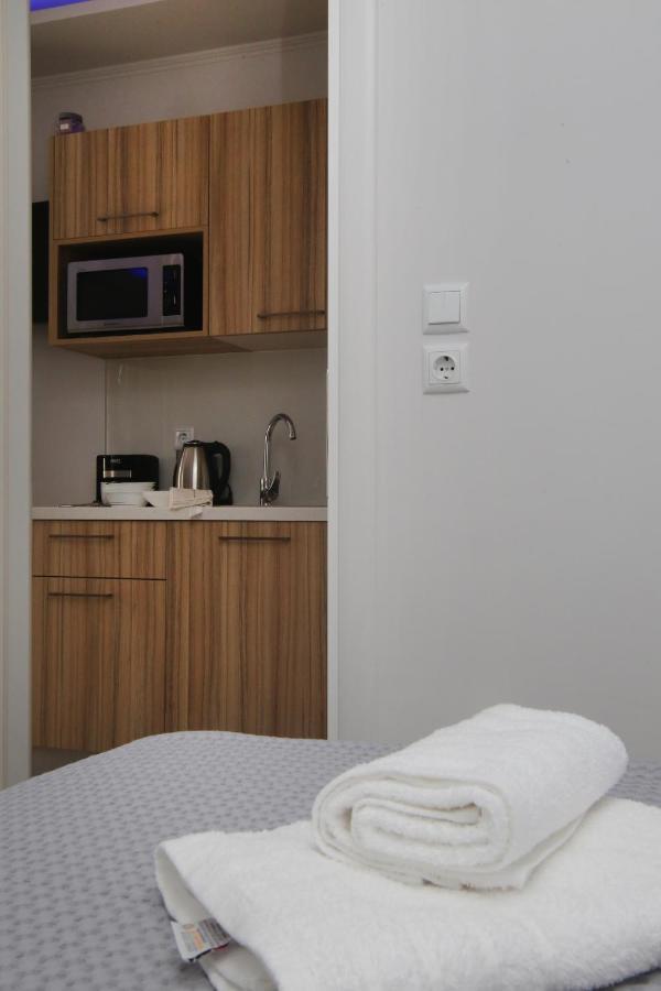 Aparthotel Sunsetperamos à Néa Péramos Extérieur photo