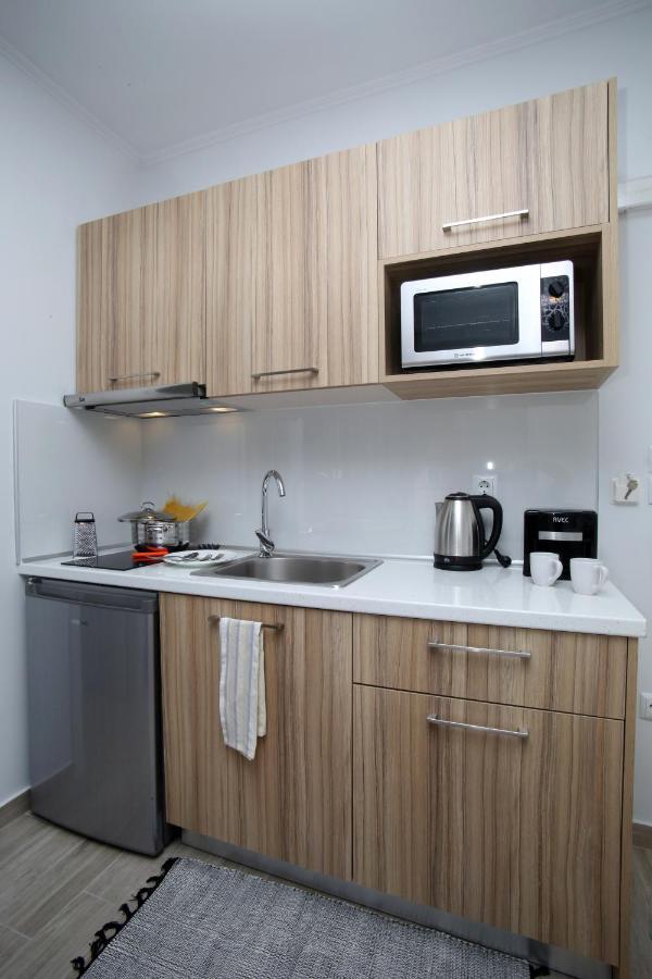 Aparthotel Sunsetperamos à Néa Péramos Extérieur photo